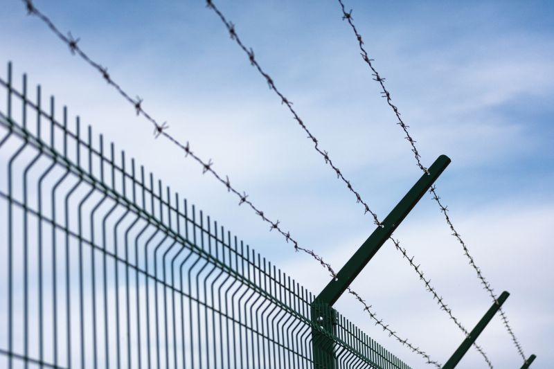 Barbed Wire Fence Installation